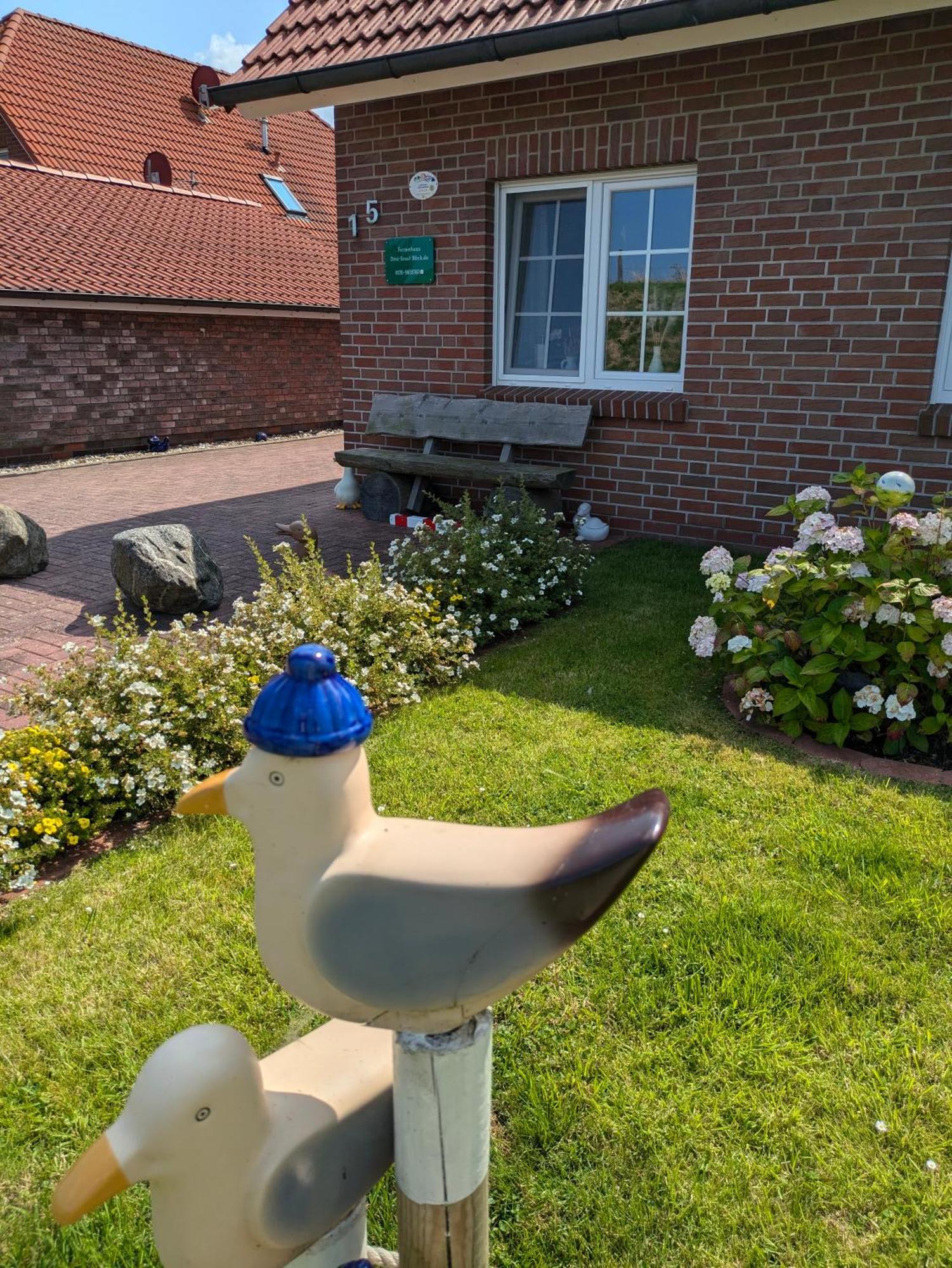 Drei-Insel-Blick Neßmersiel Exterior foto