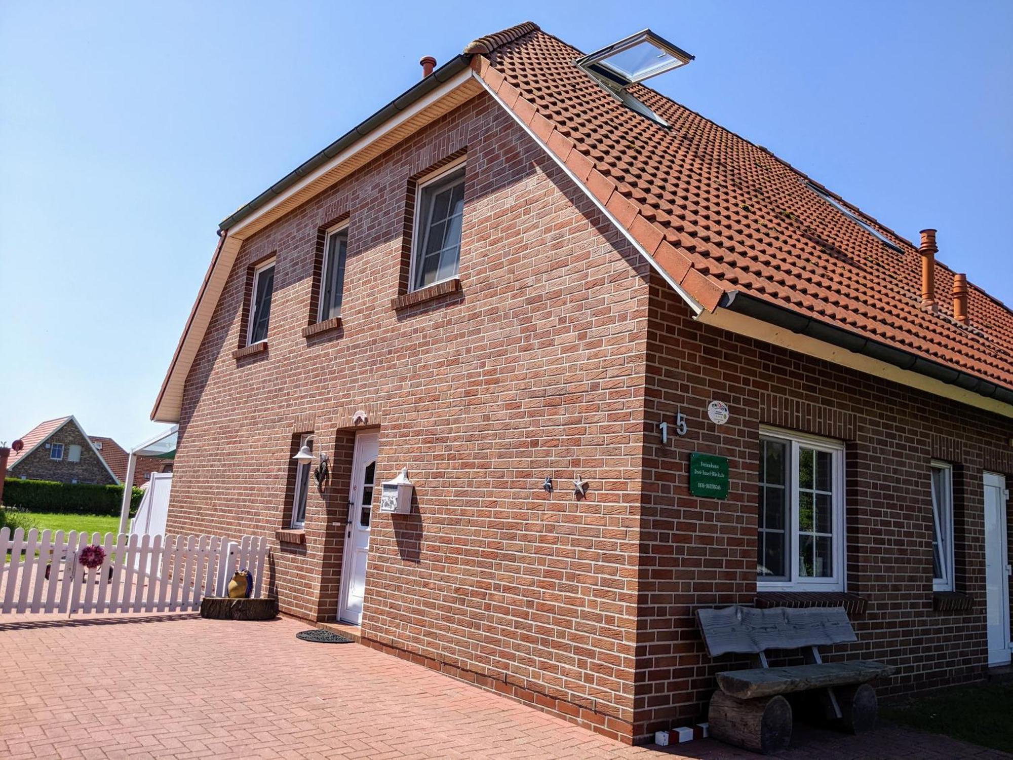 Drei-Insel-Blick Neßmersiel Exterior foto